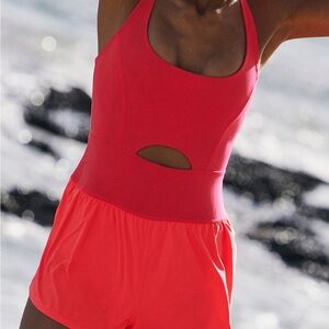 NWOT FP Movement Neon Pink Righteous Runsie One Piece Tennis Romper